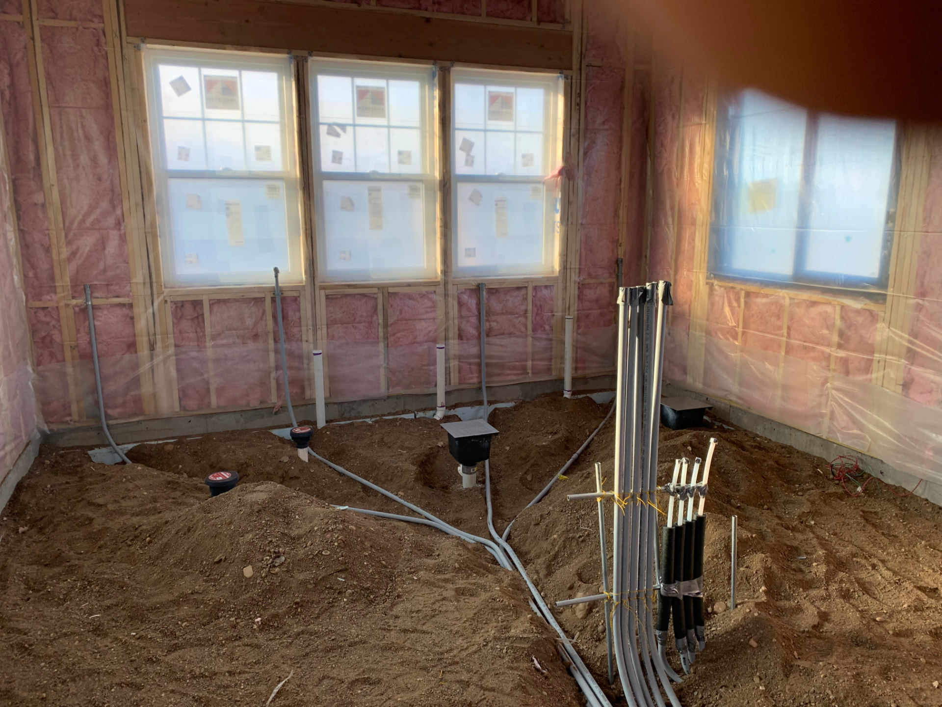 Interior conduit installation during home construction